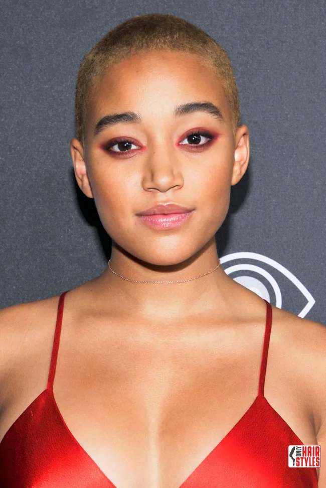 Cropped hair of the young actress Amandla Stenberg: | Bold And Beautiful: Embracing The Trend With A Buzz Cut For Women