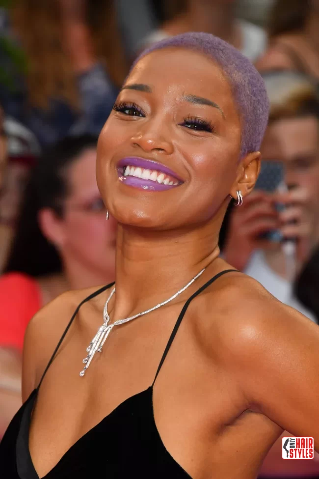 Keke Palmer with a purple buzz cut in a summer look: | Bold And Beautiful: Embracing The Trend With A Buzz Cut For Women