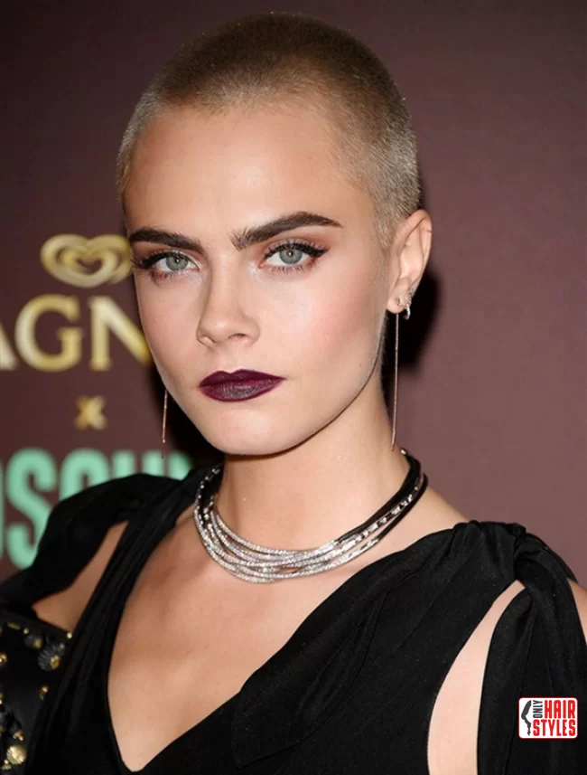 Cara Delevingne with different variations of the very short hairstyle: | Bold And Beautiful: Embracing The Trend With A Buzz Cut For Women