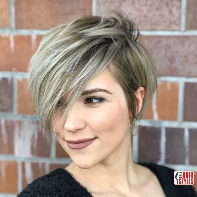 10. Cropped Pixie with Long Side Bangs | 40 Short Hairstyles That Define Sexy Sophistication In The Last Year